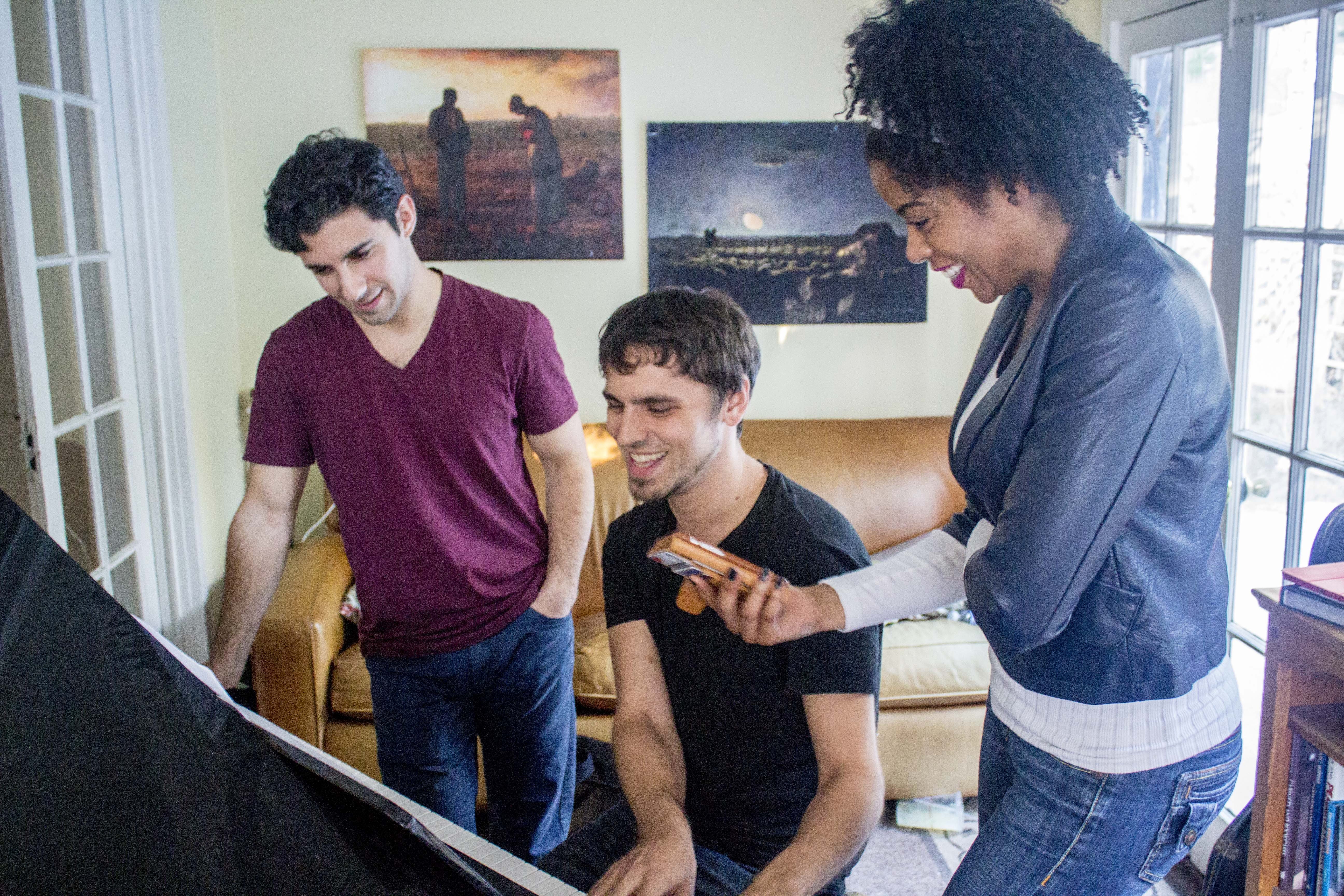 Composer Gregory Nabours runs through a music rehearsal with actors Noah James and Dionne Gipson.