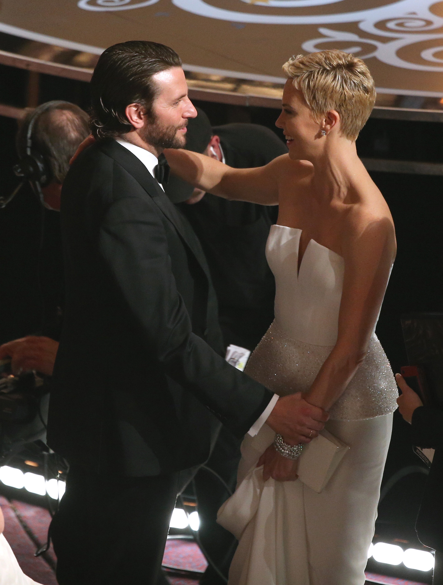 Charlize Theron and Bradley Cooper at event of The Oscars (2013)