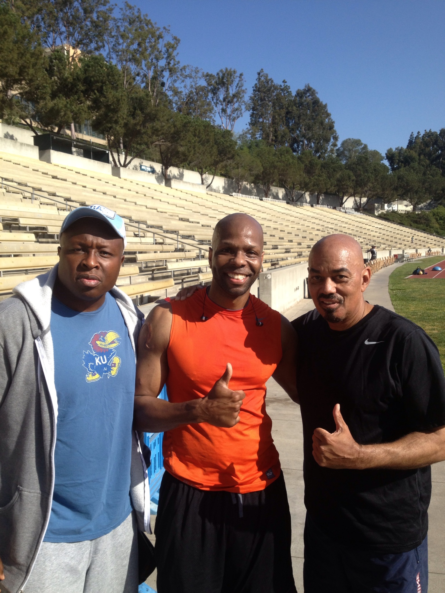 Drake stadium workouts with James Ingram on right and Steve Harris.
