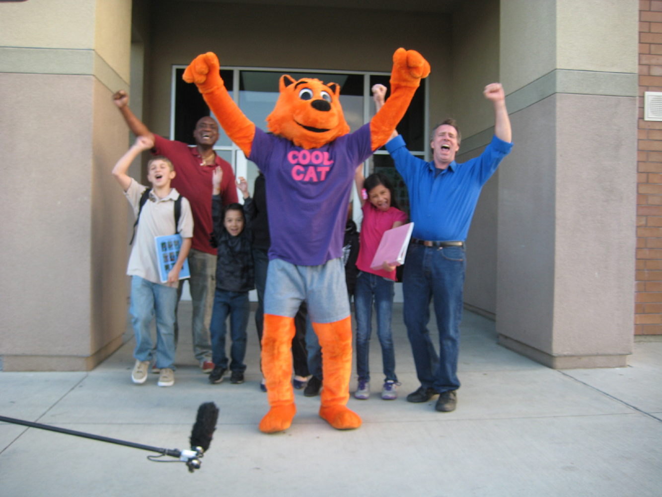 Cool Cat, Derek Savage, Starwil Reed and kids on Cool Cat Finds a Gun set