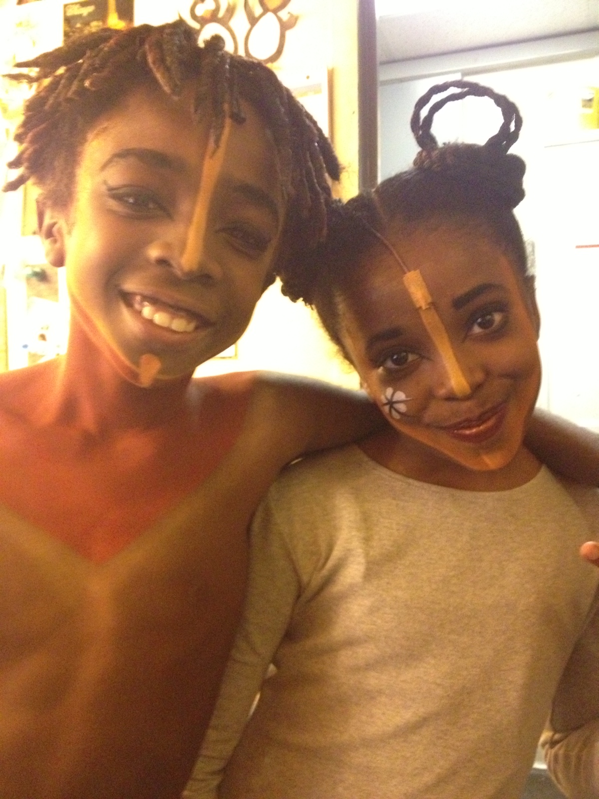 Caleb as Young Simba and Teshi Thomas as Young Nala in the Lion King On Broadway