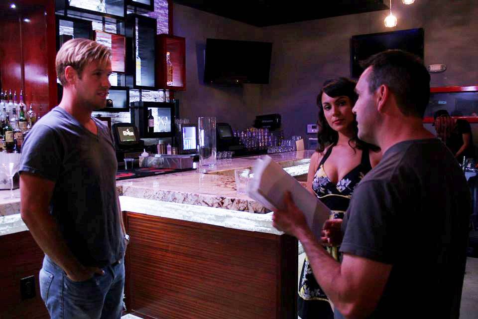R. Scott Leisk directs a scene for Gang Money Run with actors Wesley Blake and Denise Downs.