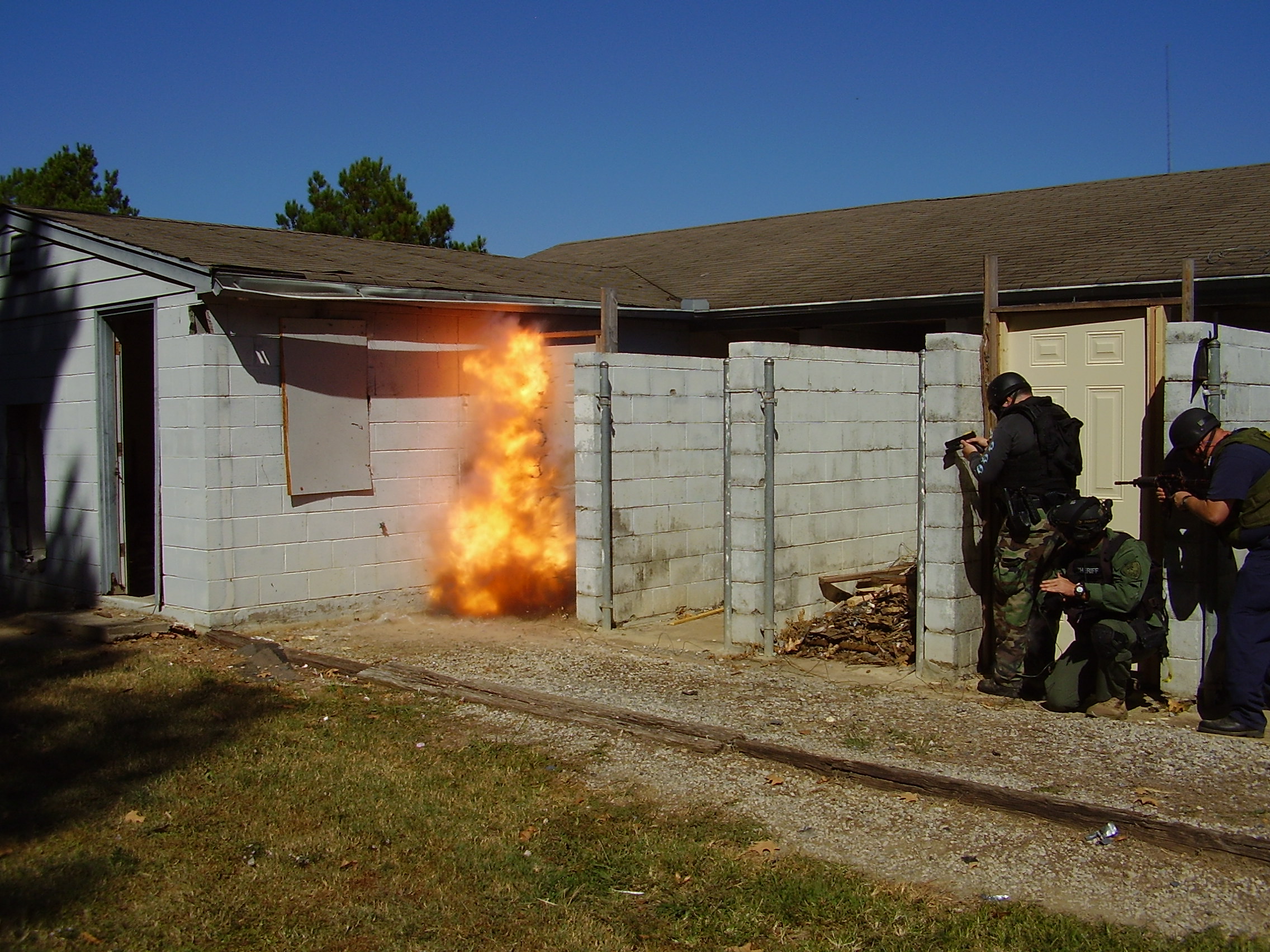 SWAT Team Explosive Breacher blowing a 50gr. 