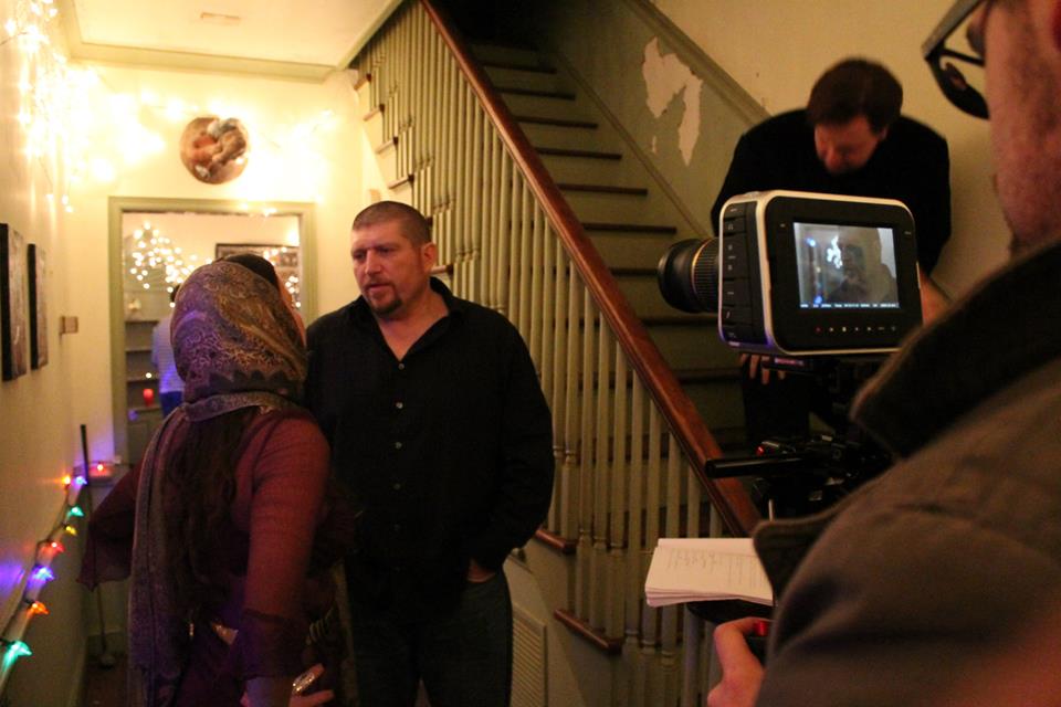 Director Mike Acosta with actress Tina Reynolds & Adam Hulin, and Justin Wallace on set of Devolve Babylon.