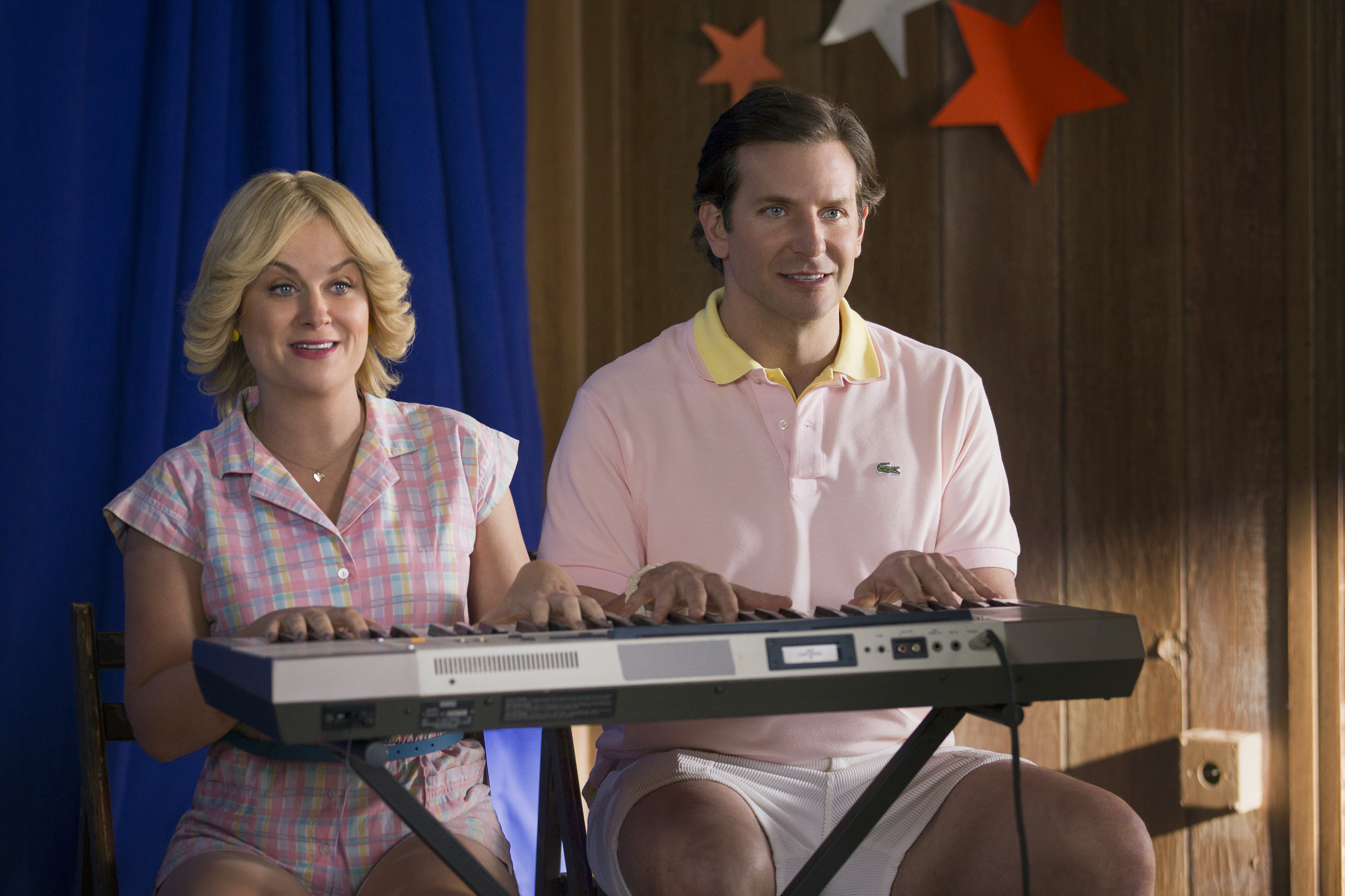 Still of Bradley Cooper and Amy Poehler in Wet Hot American Summer: First Day of Camp (2015)