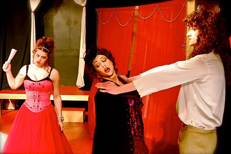 Bridget O'Neill as Arsinoe in The Misanthrope, with Bryan Bender and Hannah Mootz.