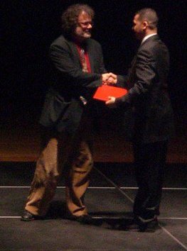 Fethi Bendida accepting his certificate filmmaking from his instructor Howard Phillips graduating from CDIA@ Boston University filmmaking . 2009