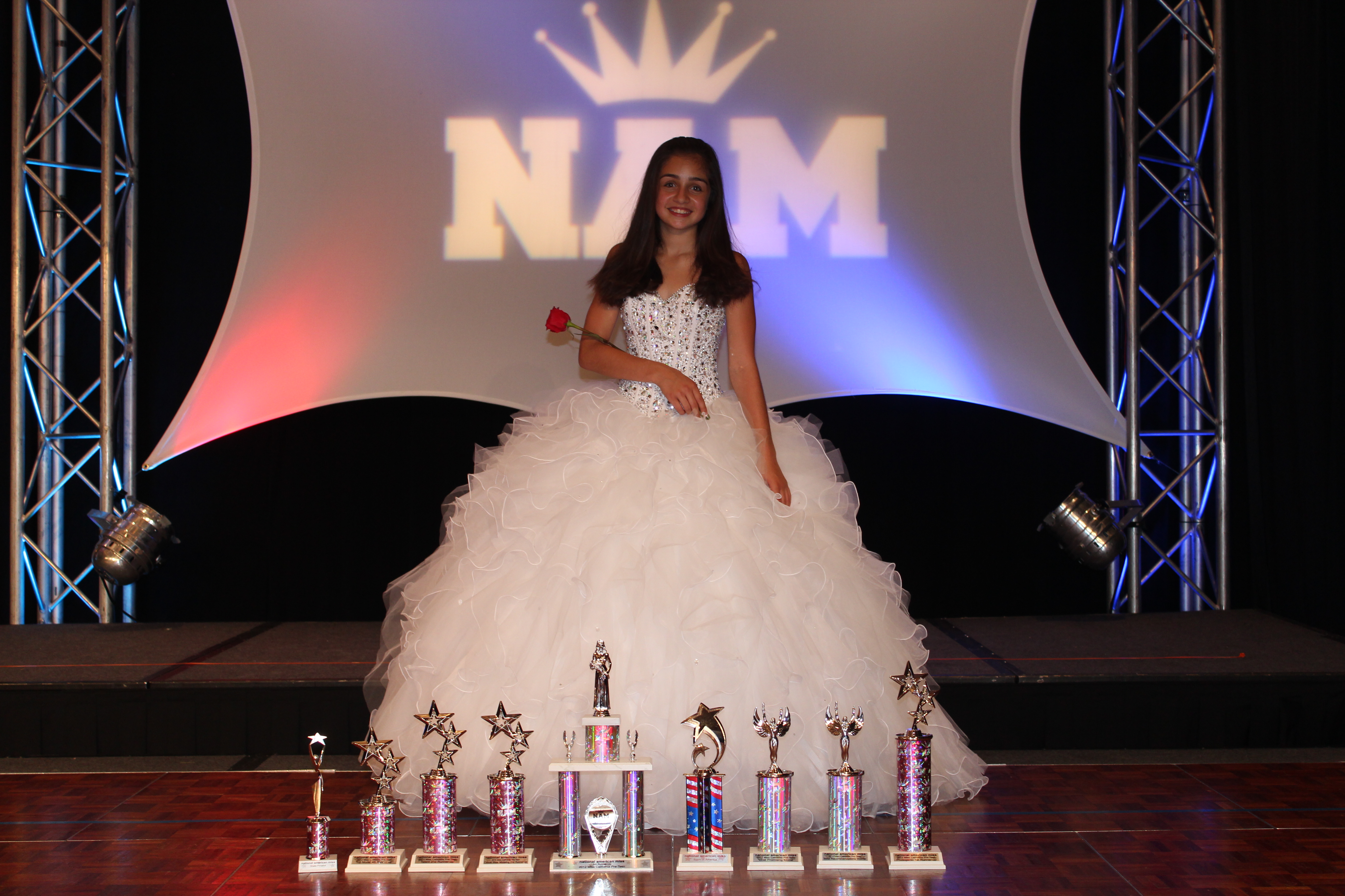 Samantha won 3rd rummer up our of 94 girls in the NAMiss Southern California Pageant. She also took home 9 trophies in all different categories. She qualified for Nationals two years in a row.