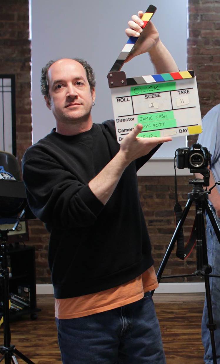 When not in the writers room, Mike Morucci is seen here slating scenes on the set of Click! The Web Series