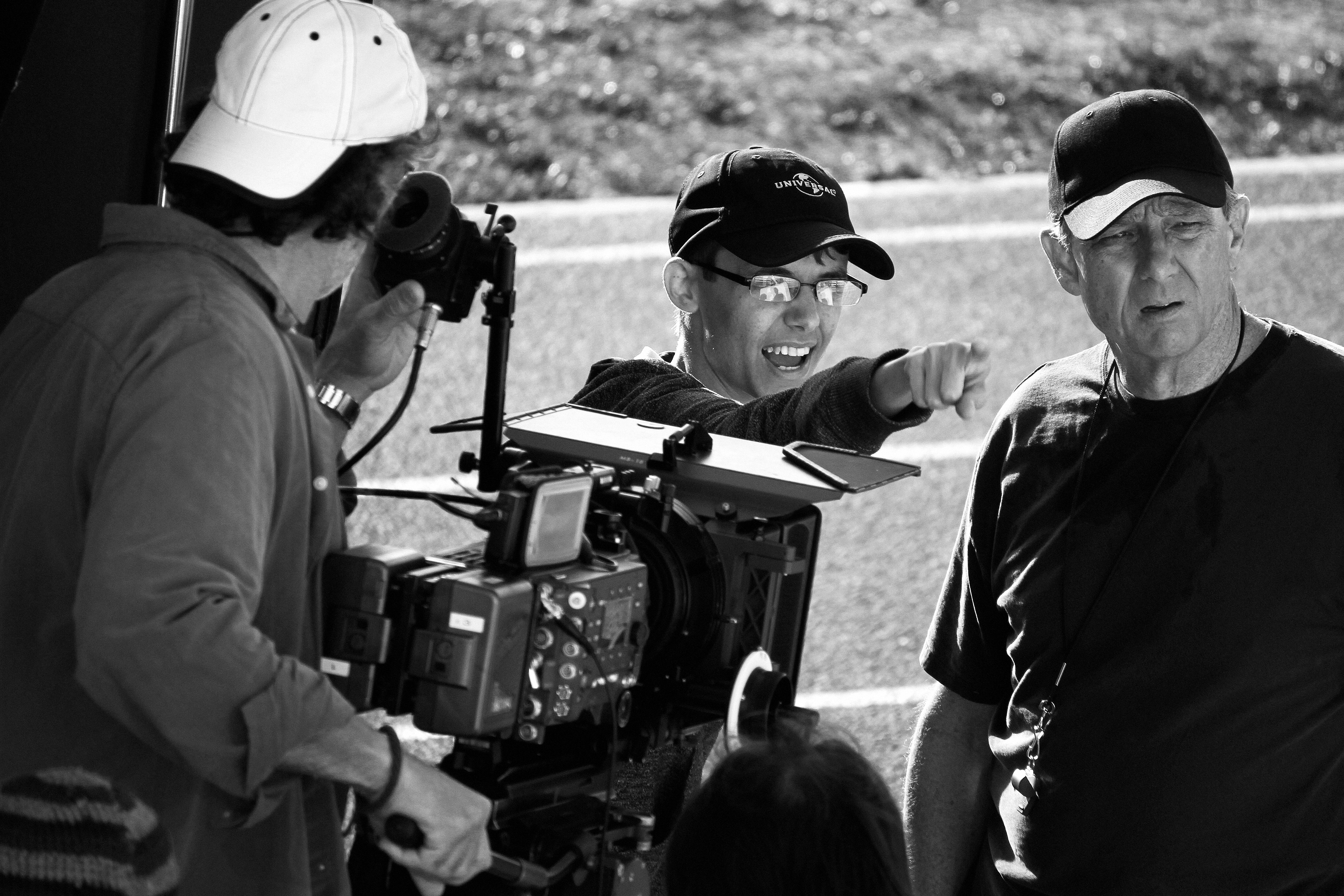 Grant Martin directs Jim Mullins (Harlin) on the set of 