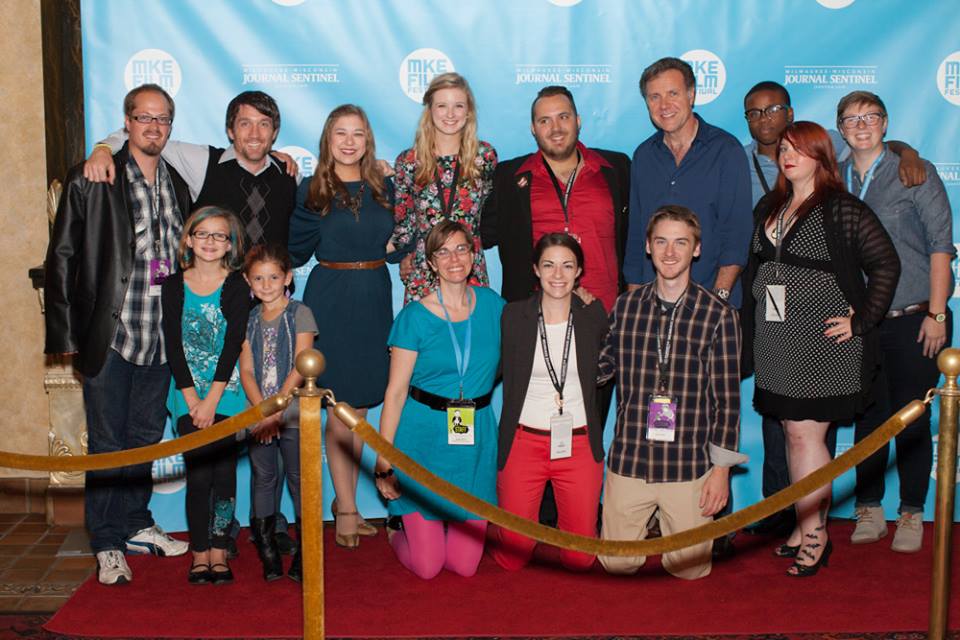 Simon with his daughters as well as the cast and some crew members of LOVE YOU STILL at the 2013 Milwaukee Film Festival.