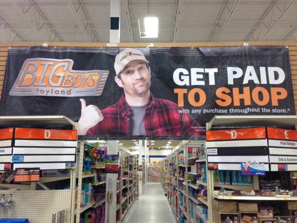 Simon Provan's recurring role in the Mills Fleet Farm commercials is now also featured throughout the stores in print ads, banners and life-size cutout for post-Christmas sales event.