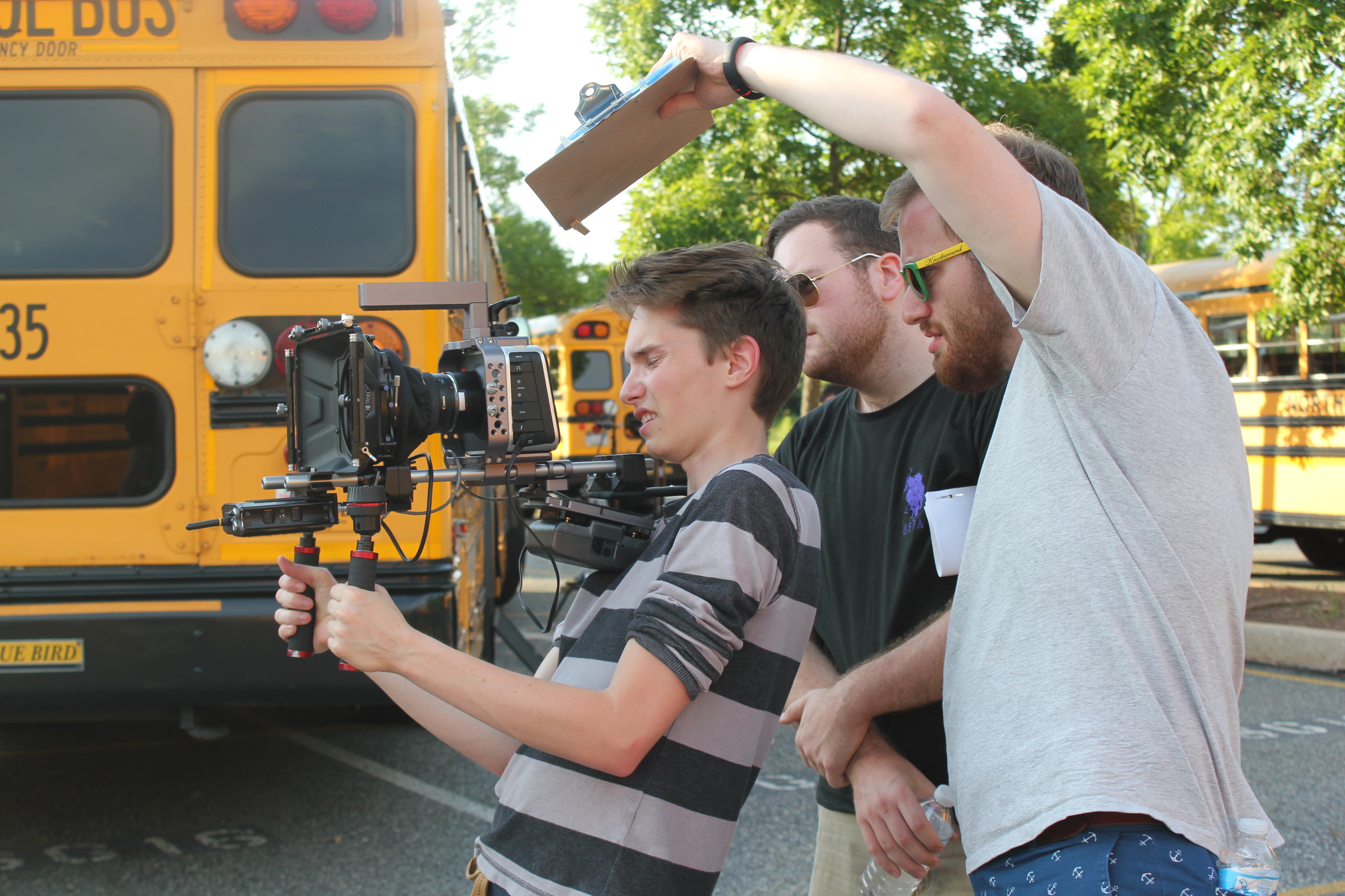 Johno Faherty looks over Director of Photography, Joe Staehly's shoulder to view the shot on the set of Witch Hunt