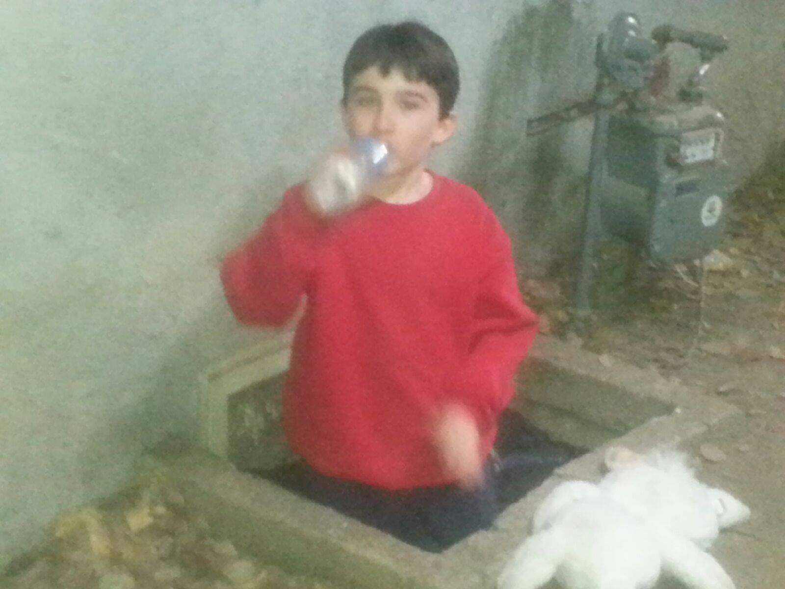 Taking a water break while filming The White Rabbit hiding from Demian