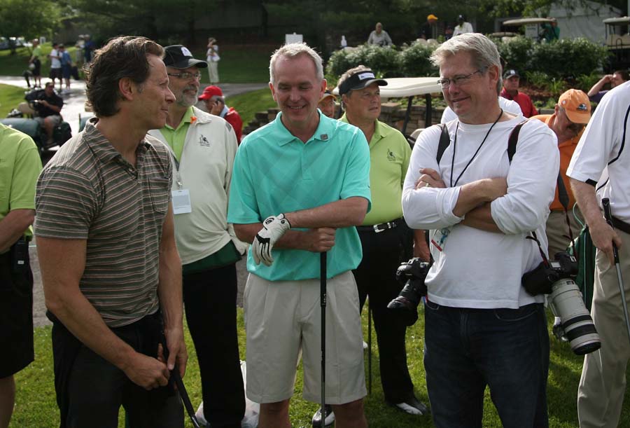 Sharing a laugh with actor Steven Weber at the Principal Charity Classic in Iowa, 2011.