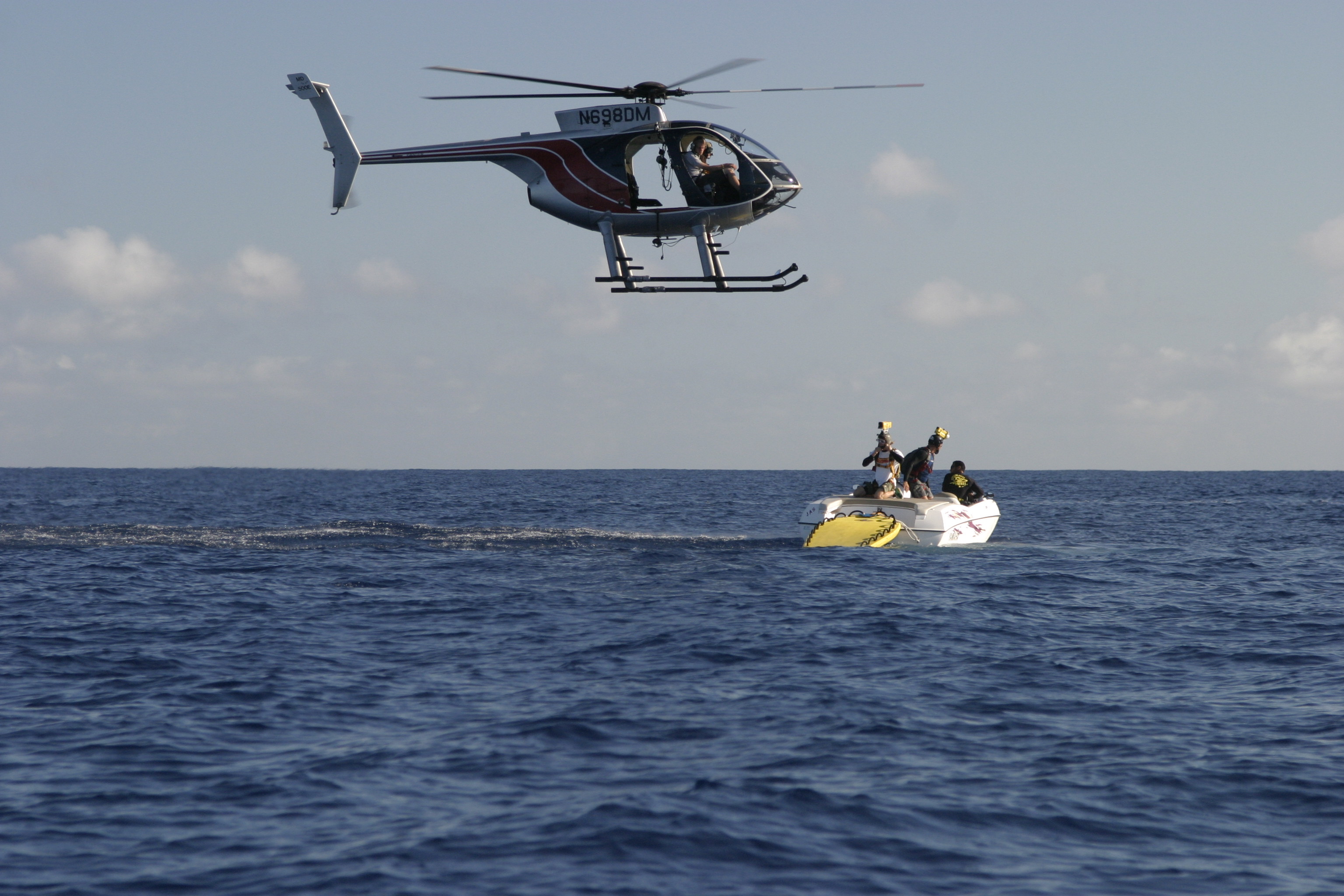 Stunt Junkies Heli pick up off speed boat.