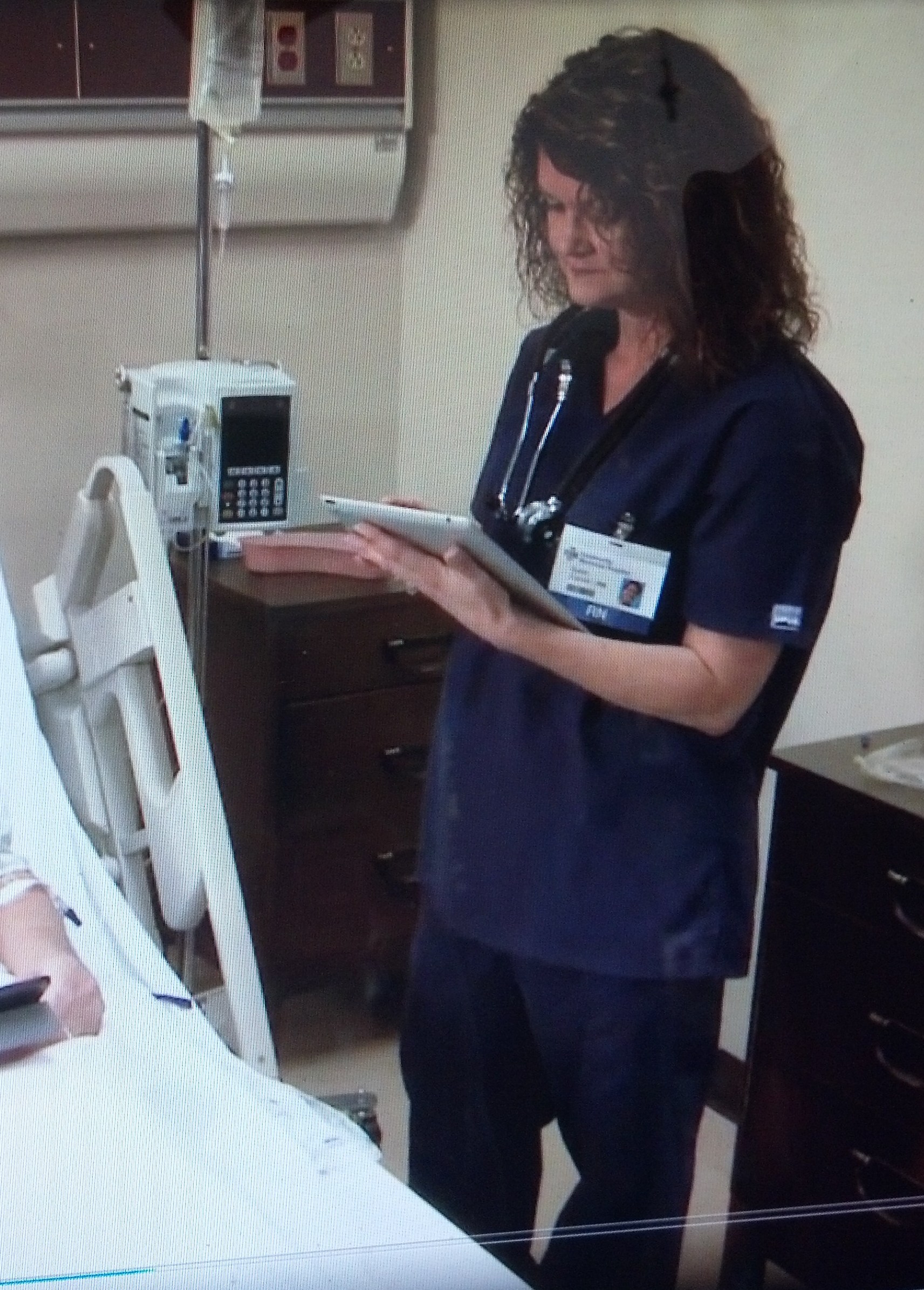 Kimberly J. Richardson as Nurse Susan in a medical training video.