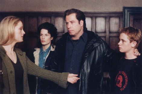 John Travolta, Teri Polo, Susan Floyd and Matt O'Leary in Domestic Disturbance (2001)