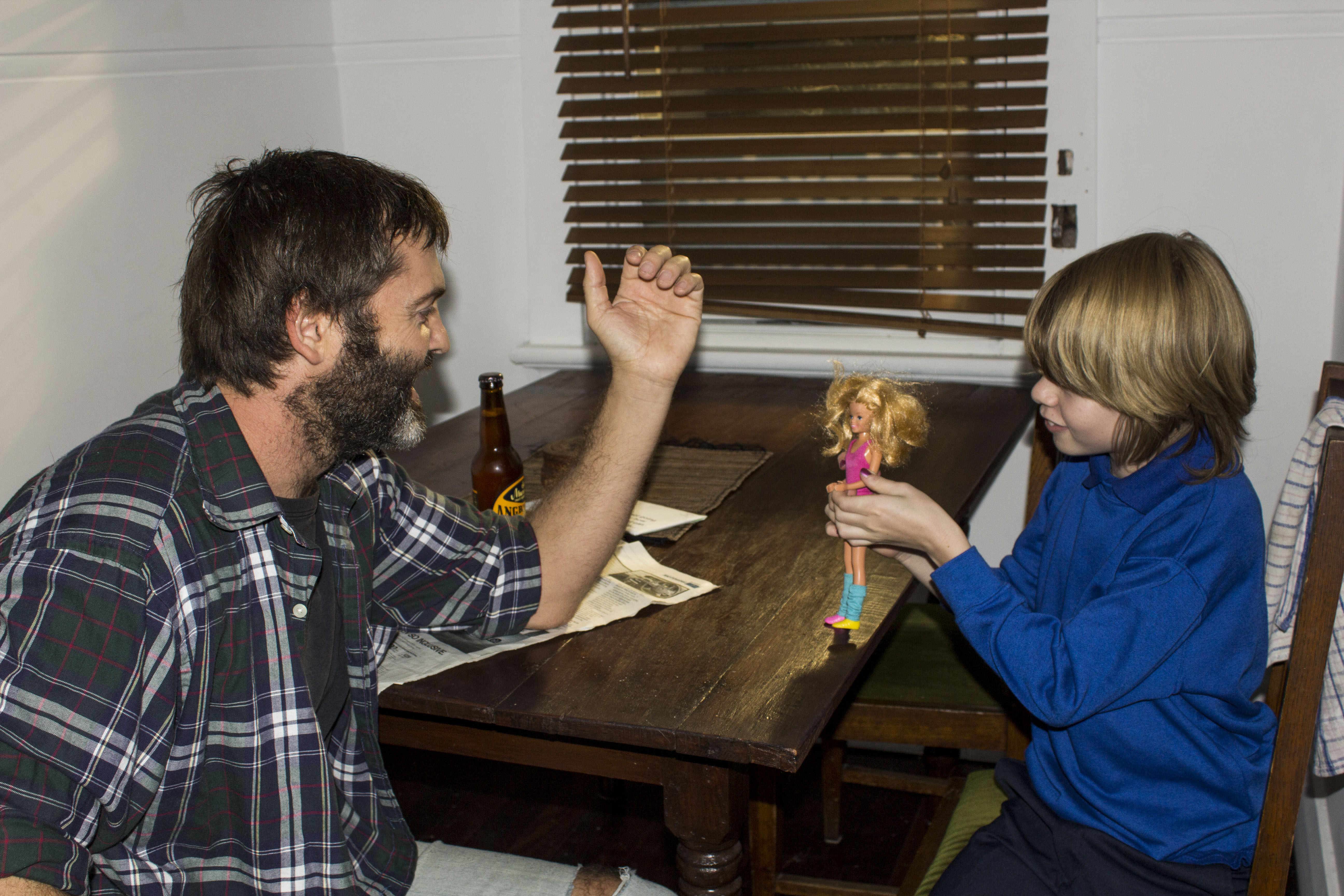 Fragile Chill out time with my on set son Alex and being challenged by his favourite Barbie to a arm wrestle....