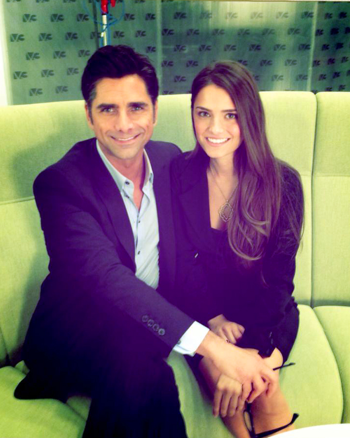 Jesica Ahlberg and John Stamos on the set of Necessary Roughness