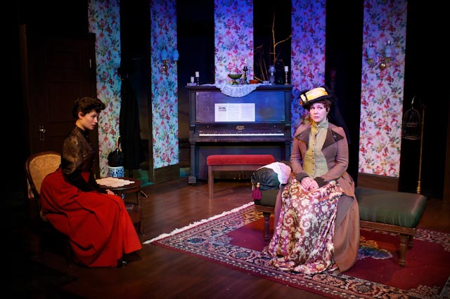 Kate MacQueen as 'Mrs. Givings and Tiffany Morgan as 'Mrs. Daldry' in Synchronicity Theatre's production of 