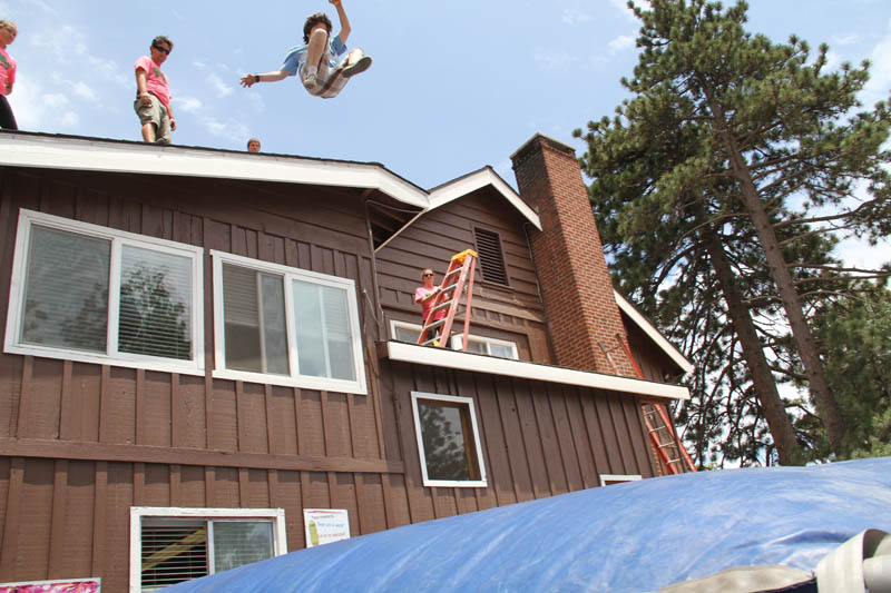 Alek practicing two story Building Jumps at Stunt Camp