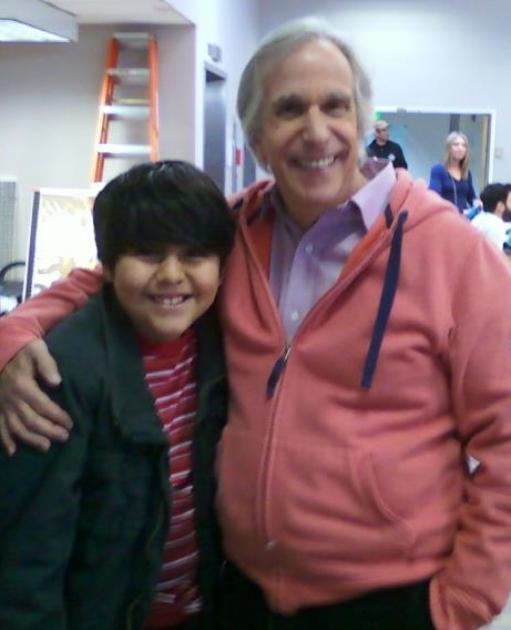 Carlos C. Torres with Henry Winkler on Children's Hospital set.