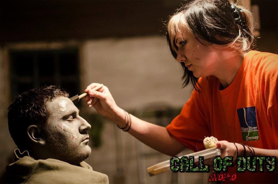 Chelsea Baran doing make-up work on the principle zombie, Salvatore Sabia from Call of Duty Undead.