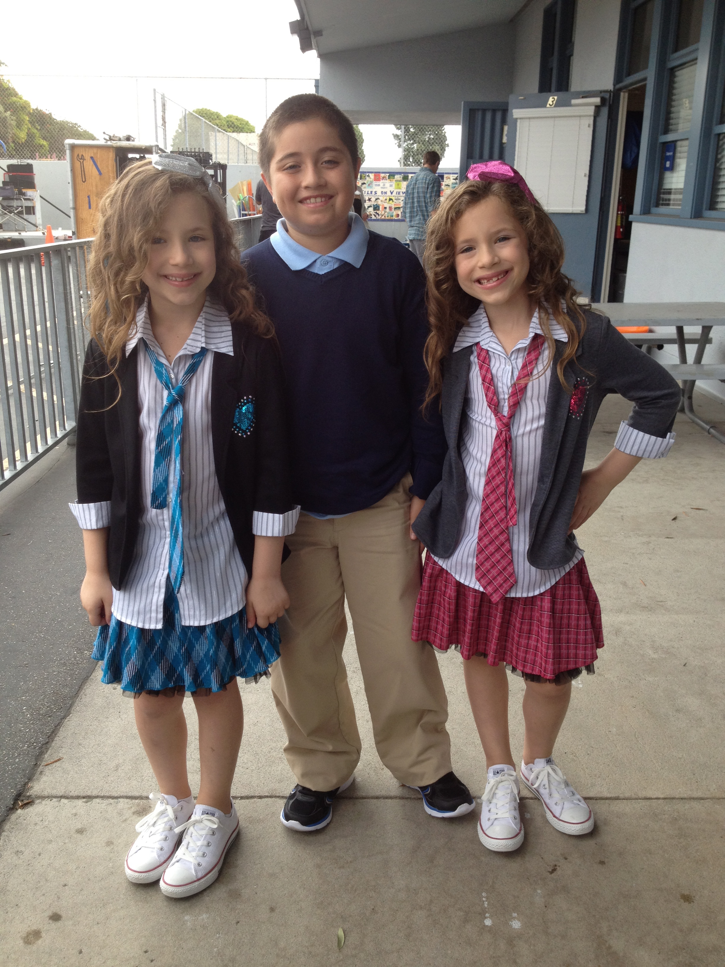 Chirstian and the D'Ambrosio twins on the set of 'Let Your Light Shine.'