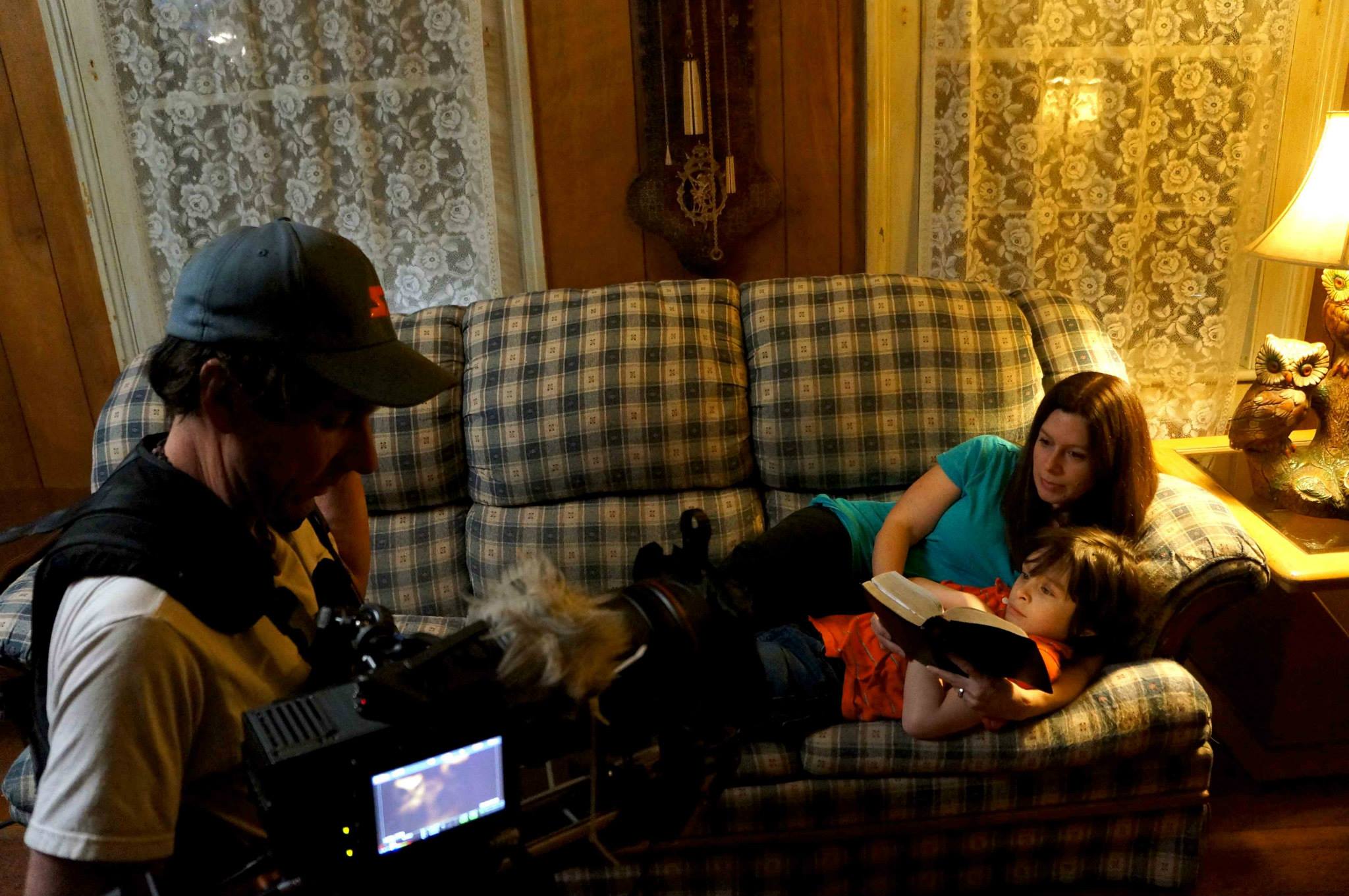 Heather Fairbanks as 'Mary' and Walker Fairbanks as 'Young Nathan' pictured with Director Ryan Davy in The Parricidal Effect