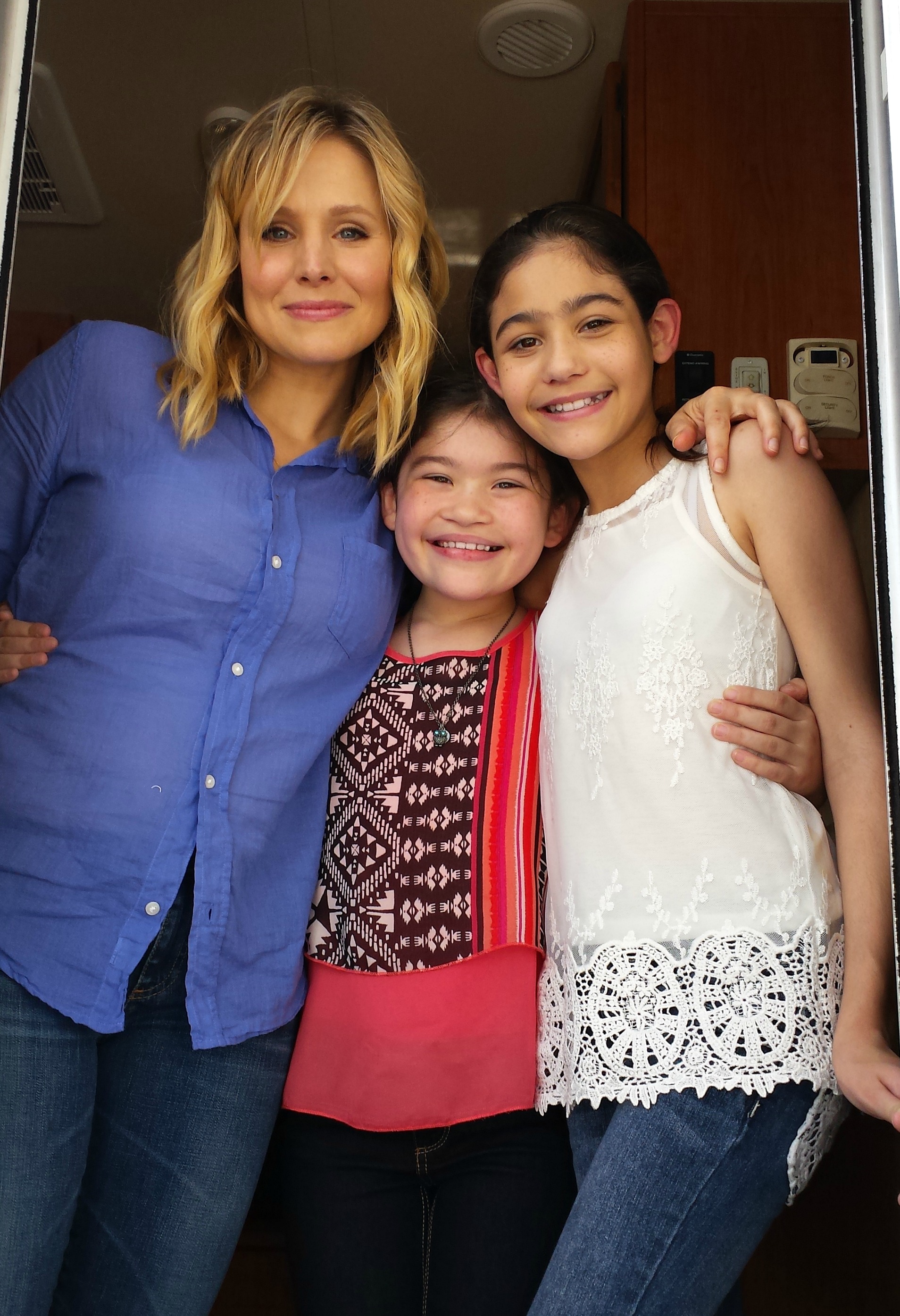 With Kirsten Bell and Elise Newcomb on set.
