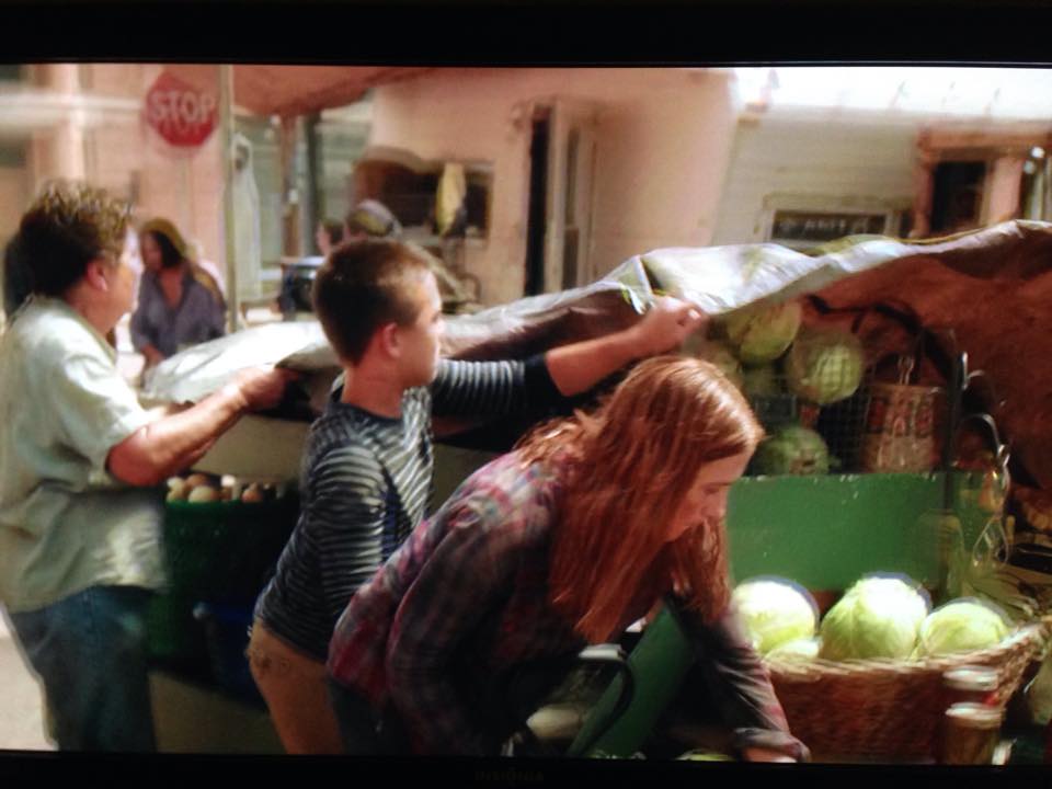 Loading the fruit cart in Willoughby with Braden and Janie on Revolution episode 2.3