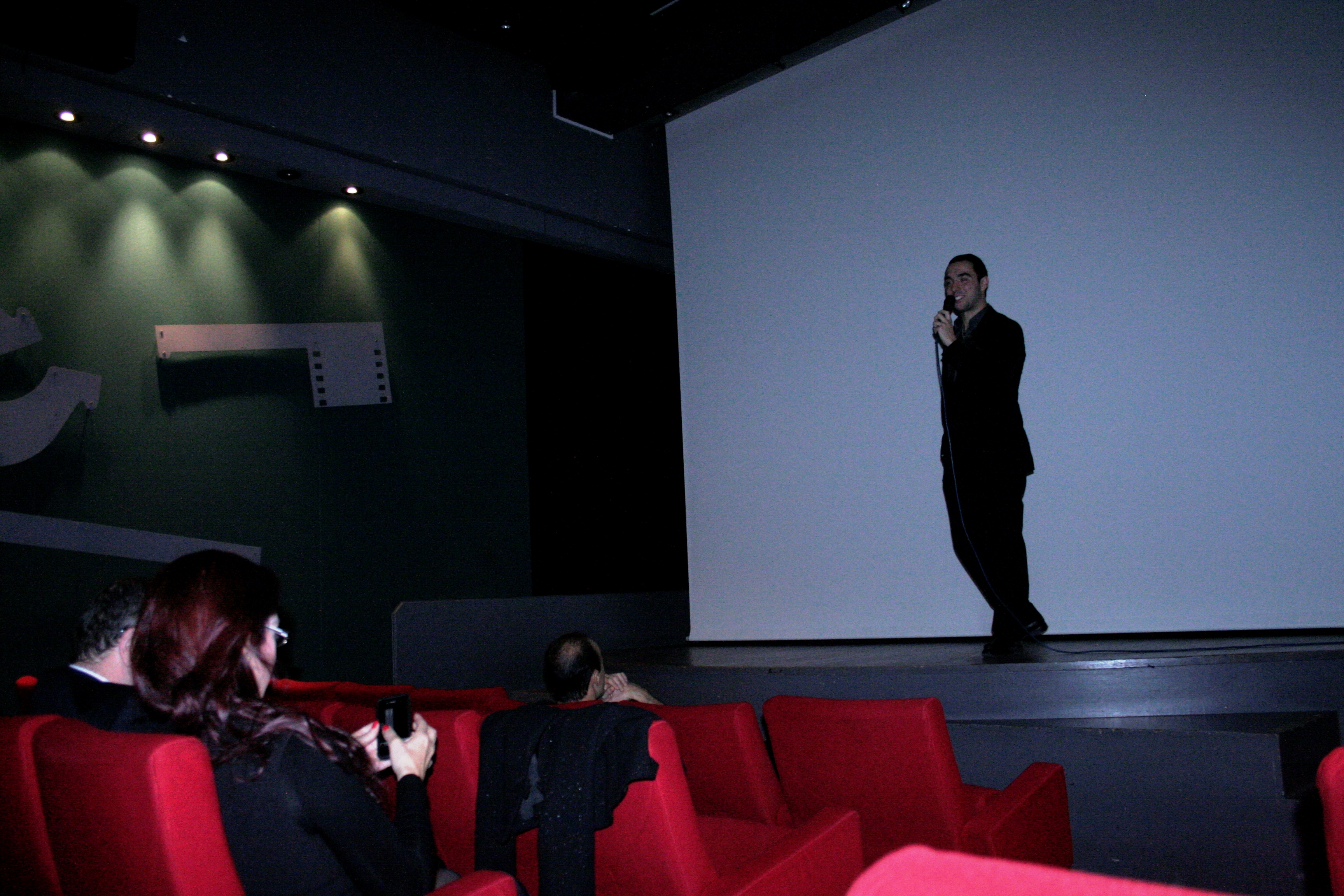 Aziz Tazi giving a speech at the European Premiere of IMAGO