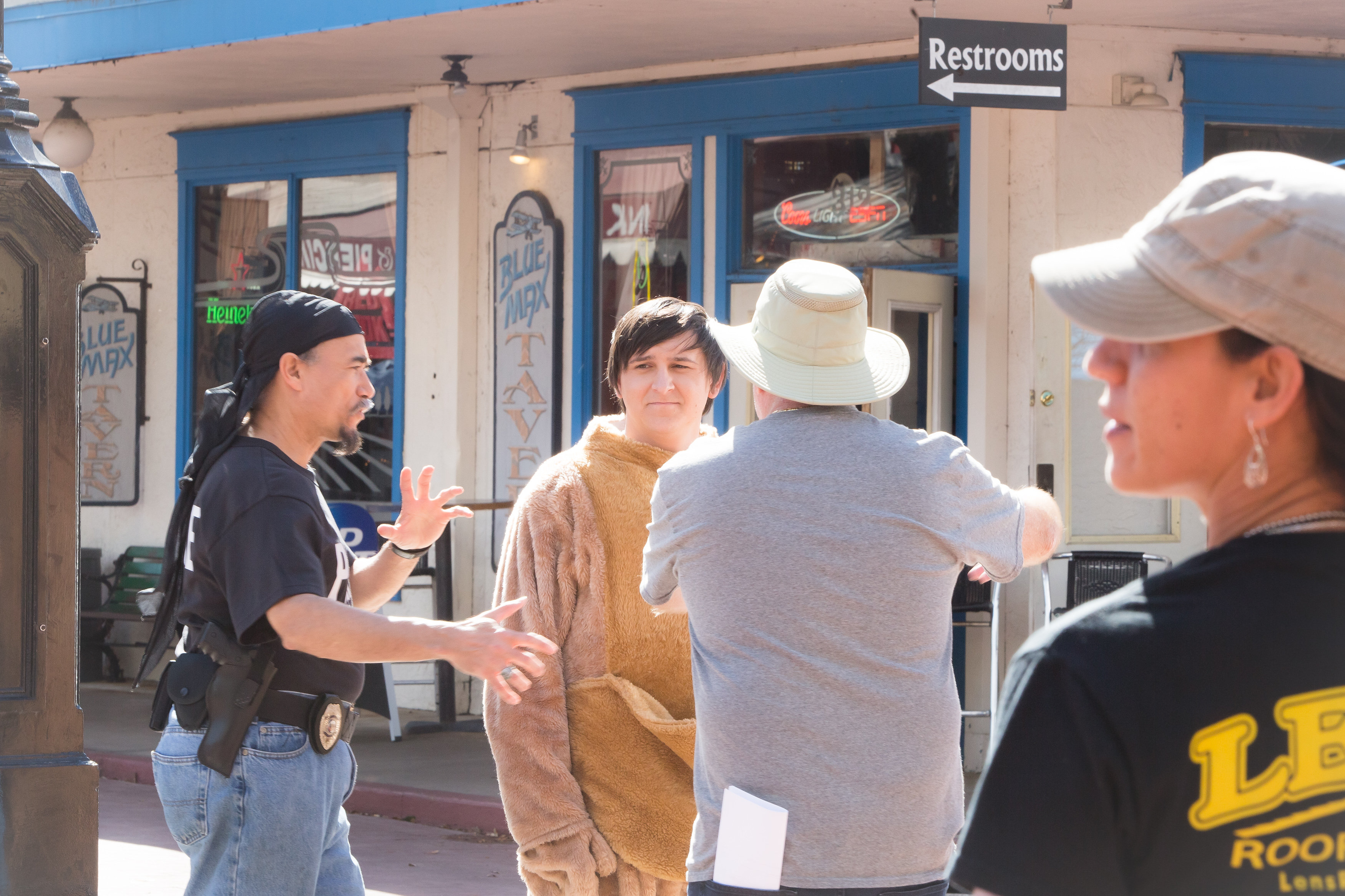 On the set of Characterz where i played a Cop,planing a scene with the director and Mitchel Musso