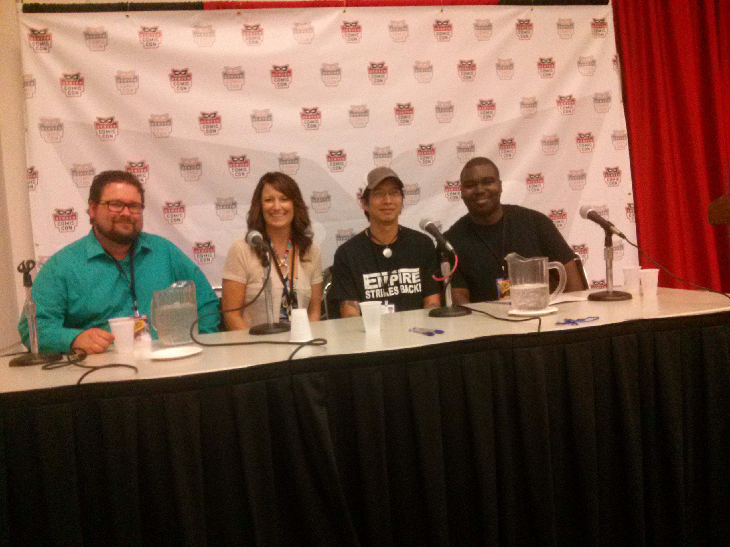 Visual effects team at Denver Comic Con 2014 during the Inner Dimension VFX panel. Visual effects artist from left to right; Mike McMahon, Lisa Phelps, Van Fischer, & Antoine M Dillard