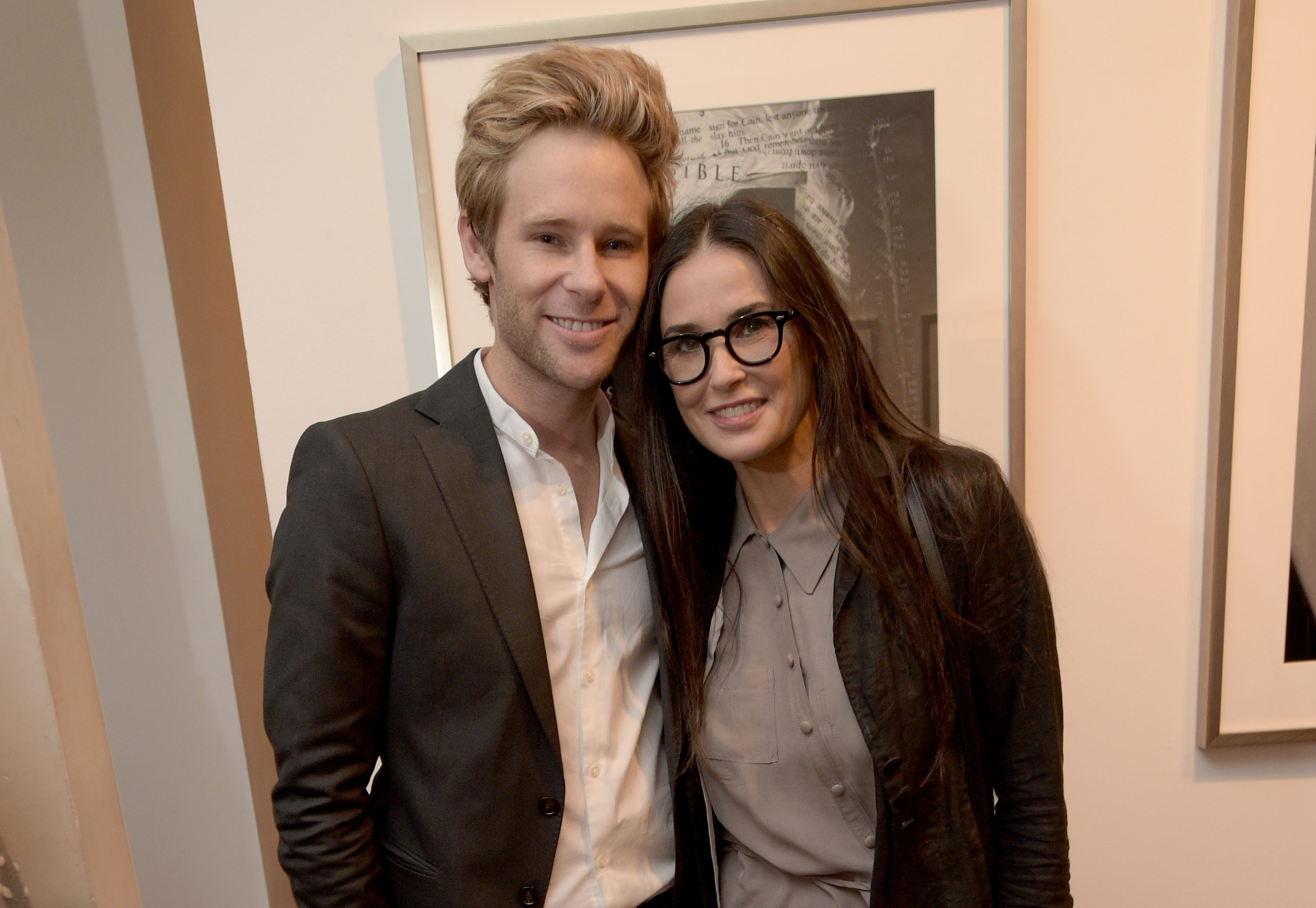 We. Alone. A photography Exhibit by Bryan Fox LOS ANGELES, CA - MAY 09: Artist Bryan Fox (L) and actress Demi Moore attend We. Alone. A photography exhibit by Bryan Fox at Think Tank Gallery on May 9, 2015 in Los Angeles, California.