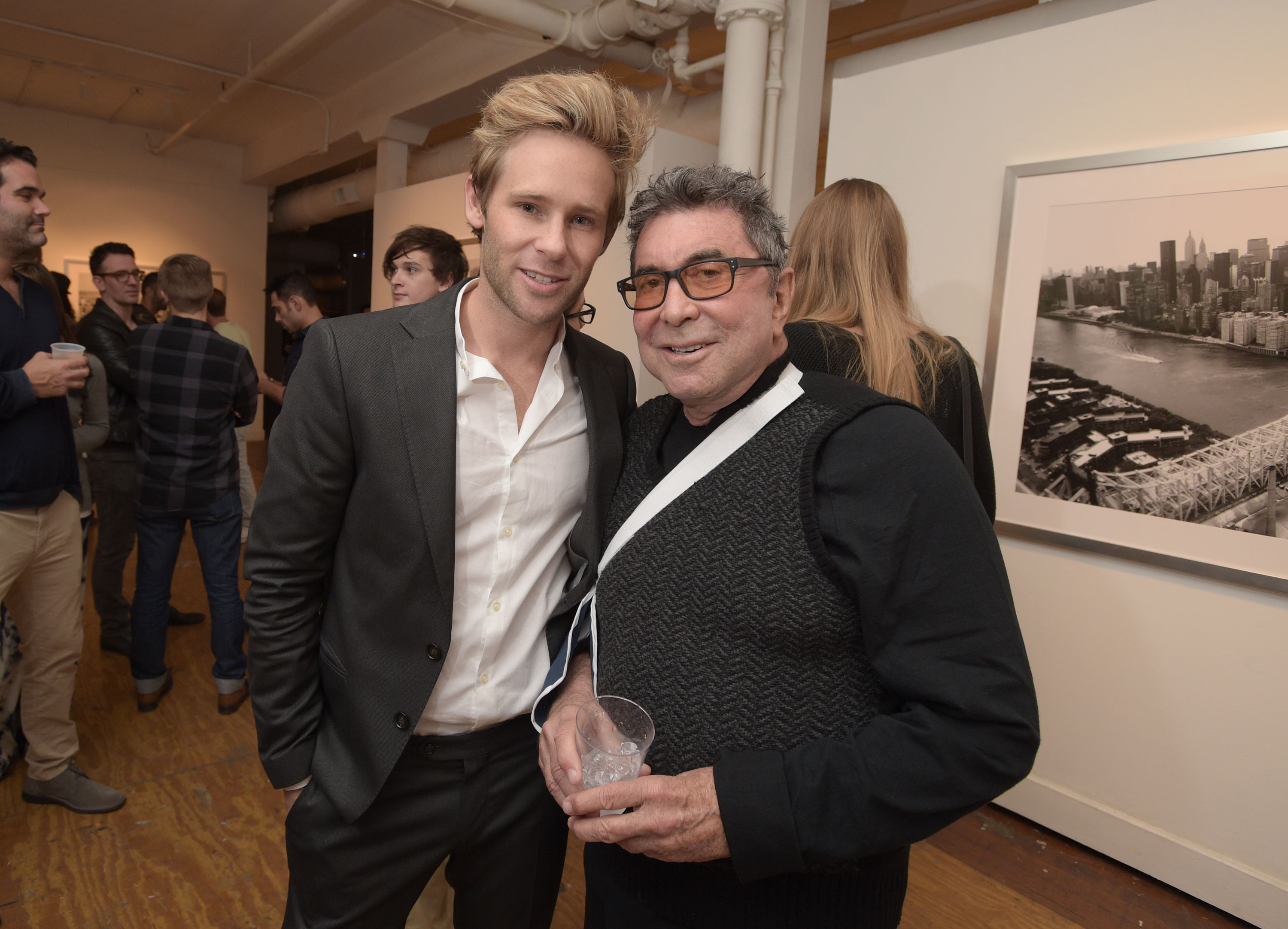 LOS ANGELES, CA - MAY 09: Artist Bryan Fox (L) and producer Sandy Gallin attend We. Alone. a photography exhibit by Bryan Fox at Think Tank Gallery on May 9, 2015 in Los Angeles, California. (Photo by Jason Kempin/Getty Images for Bryan Fox)