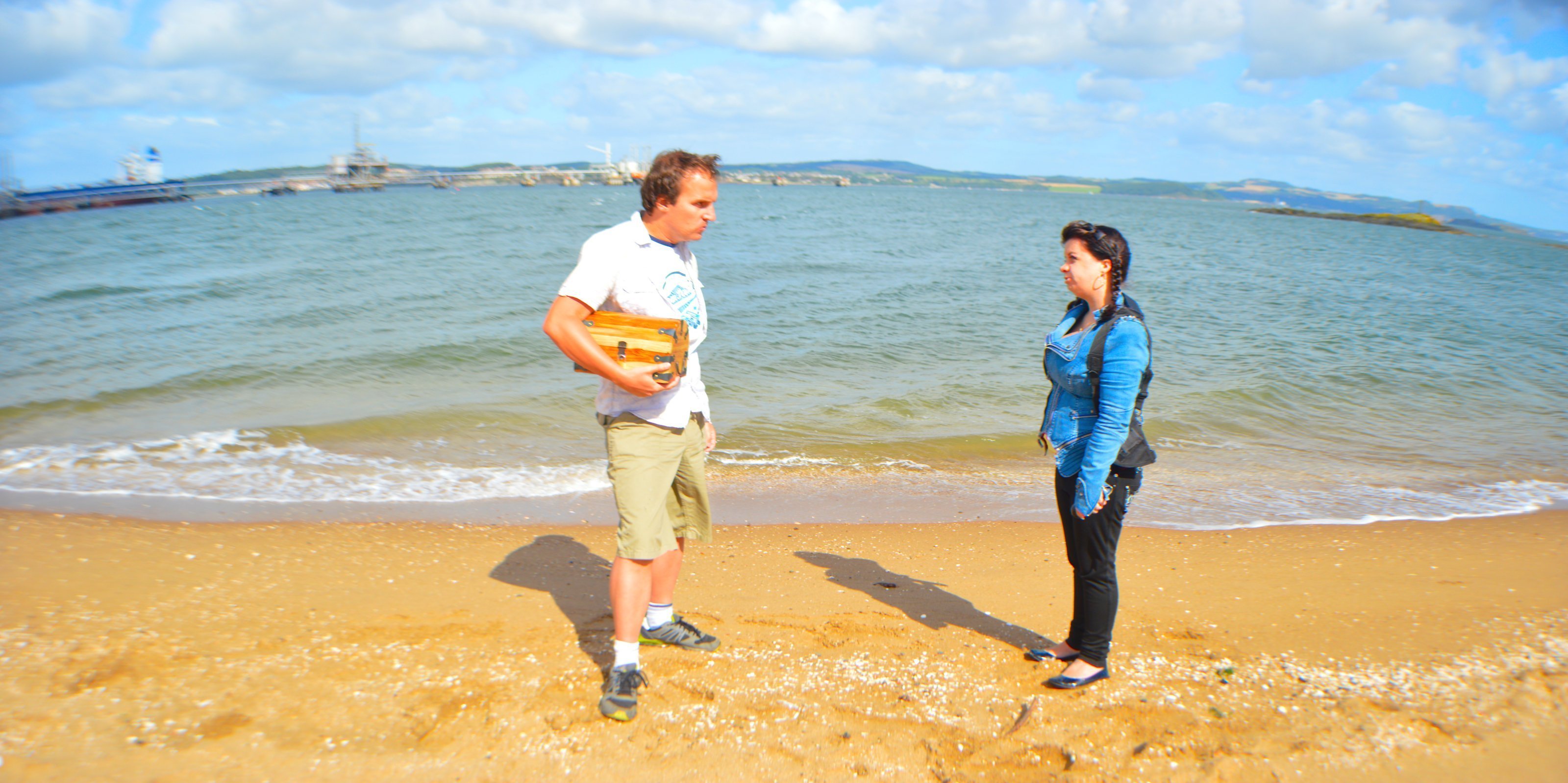 Shawn and Lady Iris confront each other on the beach.