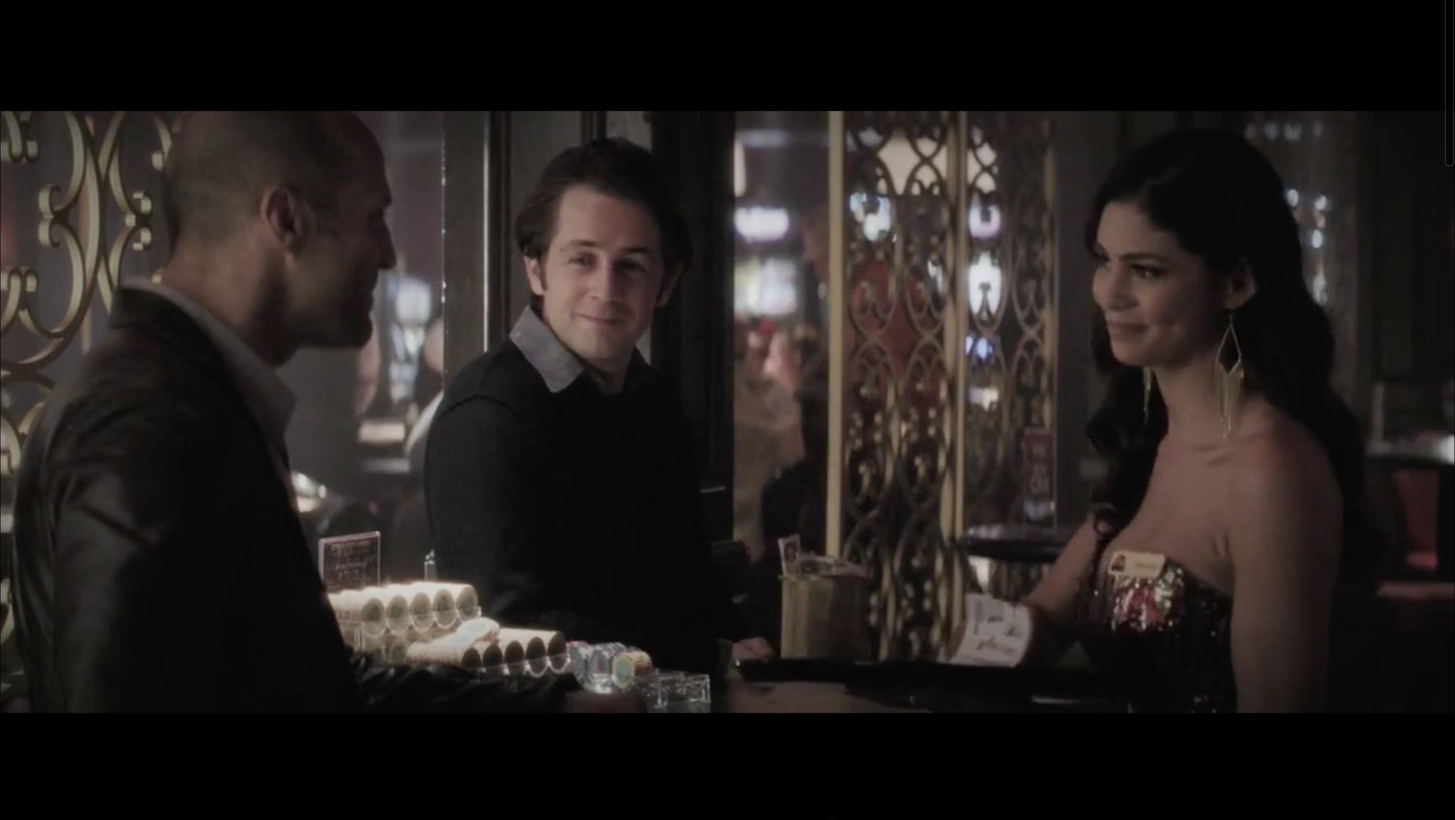 Screen shot from movie Wild Card with jason Statham and Michael Angarano