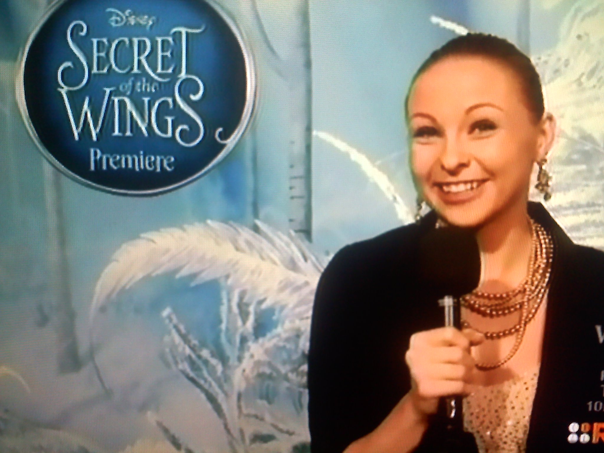 Shelby Wulfert Hosting celebrity interviews at Disney's Secret of the Wings Premier.