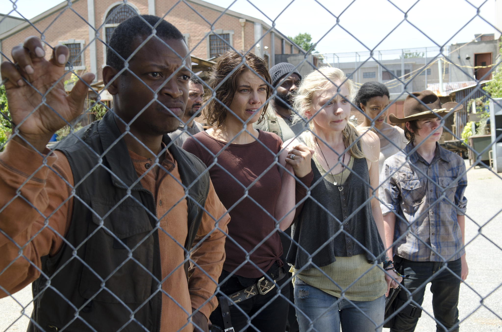 Still of Chad L. Coleman, Lawrence Gilliard Jr., Lauren Cohan, Emily Kinney, Sonequa Martin-Green, Chandler Riggs and Santiago Cirilo in Vaikstantys numireliai (2010)