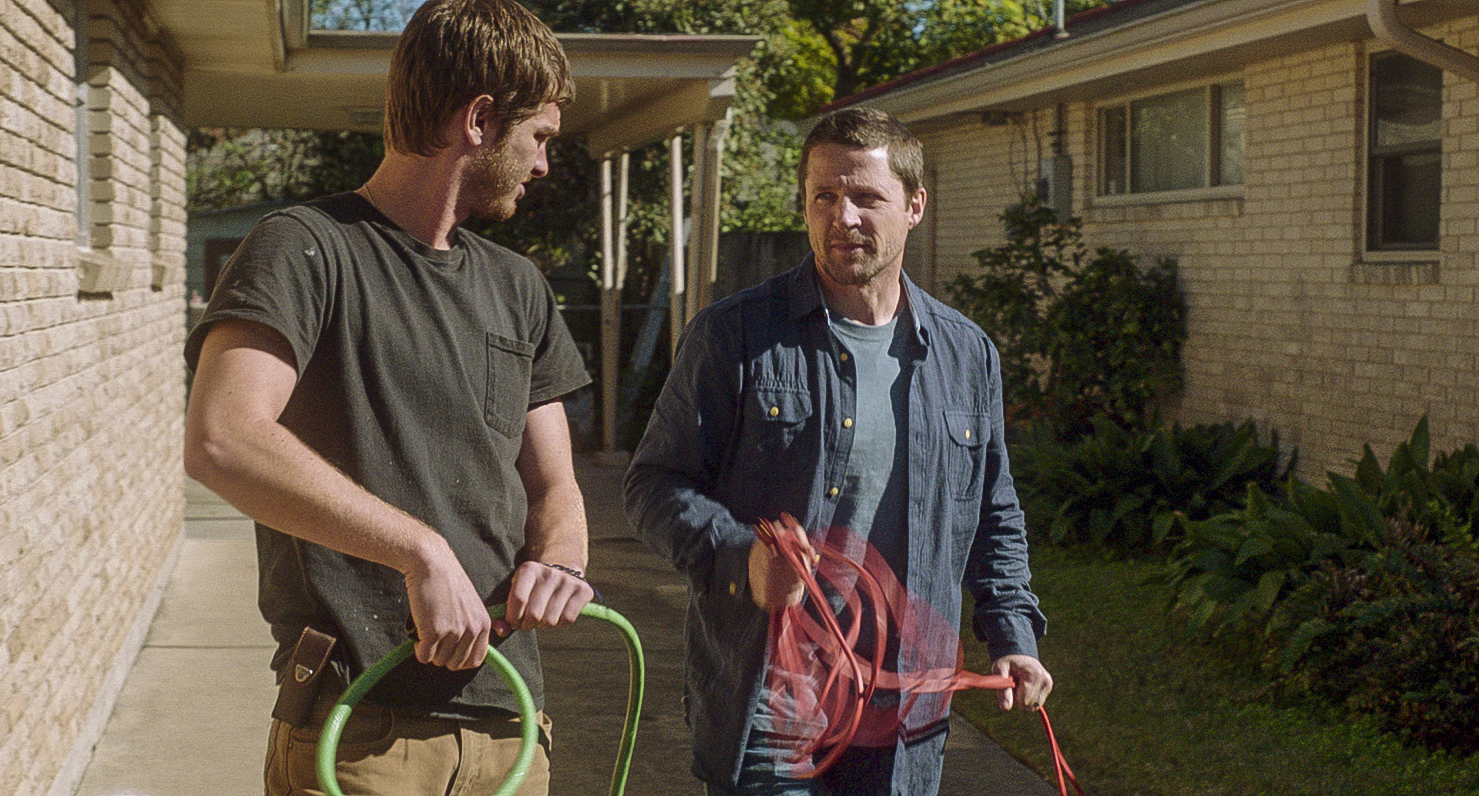 Still of Tim Guinee and Andrew Garfield in 99 Homes (2014)