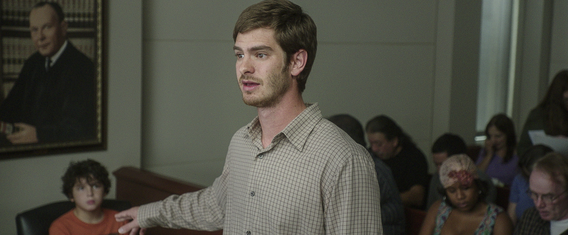 Still of Andrew Garfield and Noah Lomax in 99 Homes (2014)