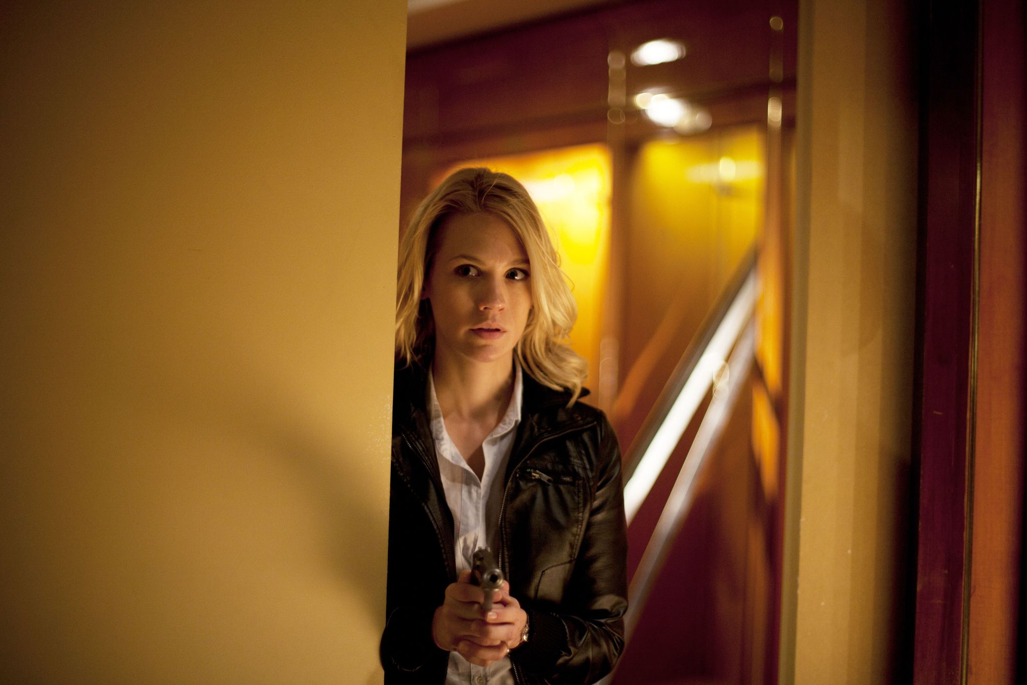 Still of January Jones in Seeking Justice (2011)