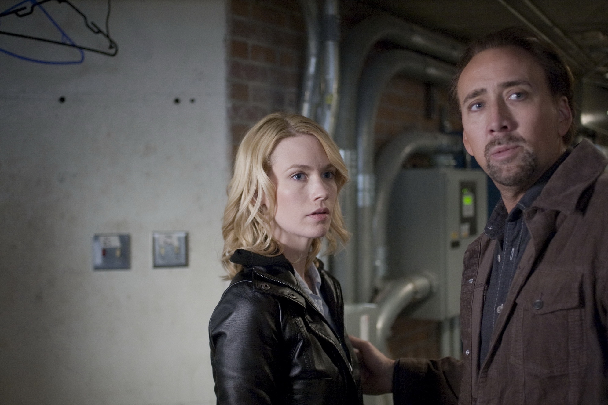 Still of Nicolas Cage and January Jones in Seeking Justice (2011)