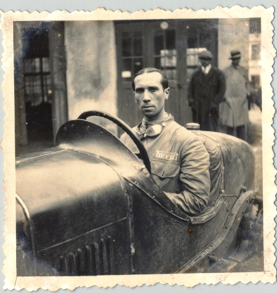 The Italian Racing Team in Lwow (circa 1932). The racecar driver is likely Achille Varzi or Tazio Nuvolari. Photo shot by Victor Perantoni.