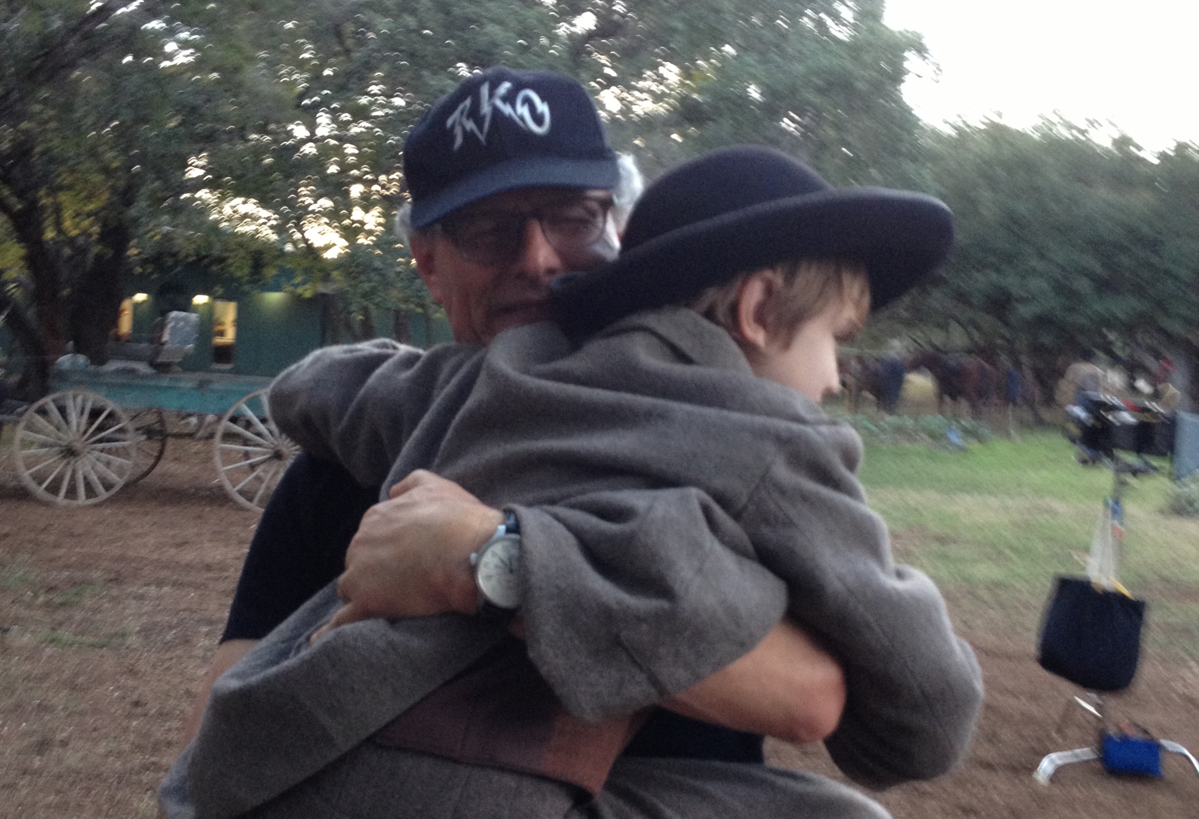 Sawyer Bell gets a hug from DELIVERANCE CREEK director, Jon Amiel.