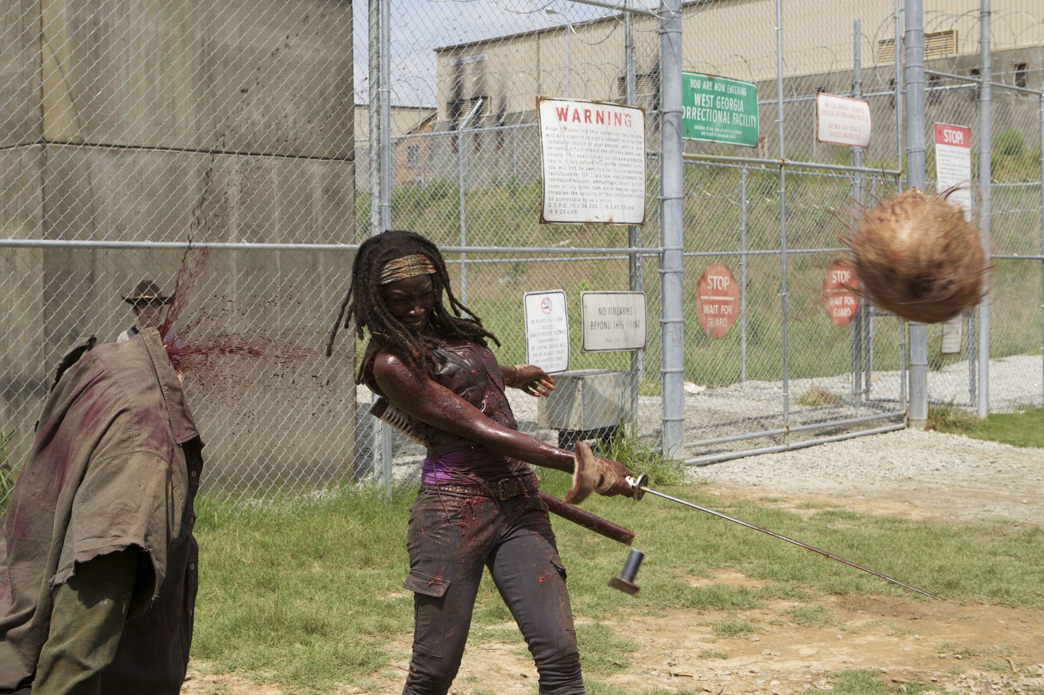 Still of Danai Gurira and Blake Tyers in Vaikstantys numireliai: When the Dead Come Knocking (2012)