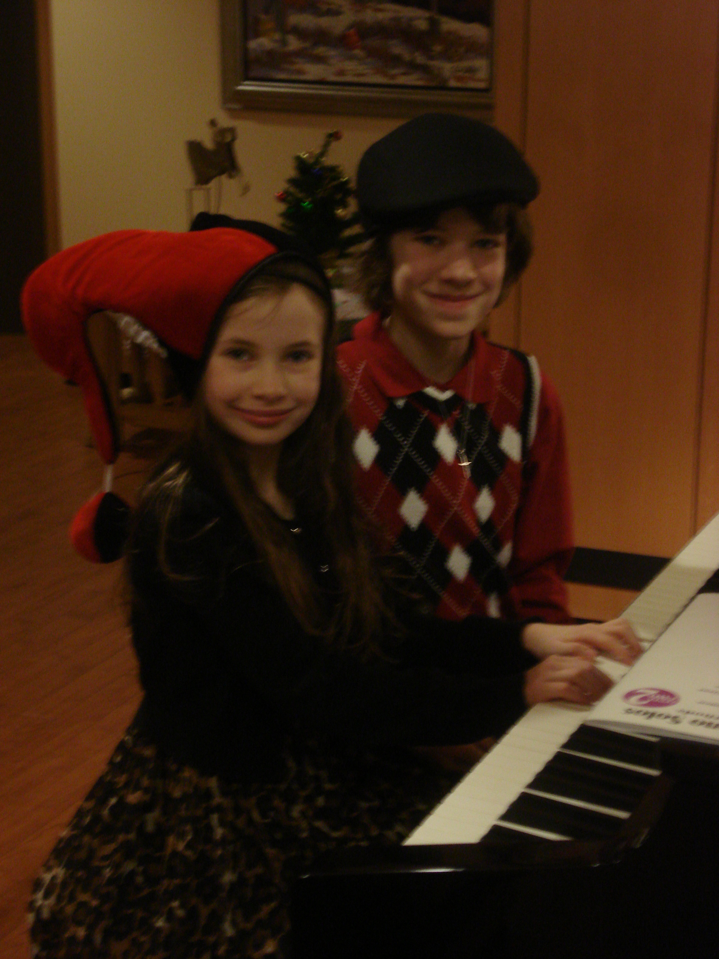 Malia and her brother Christian entertaining the patients on Christmas Day at the Ronald McDonald House.