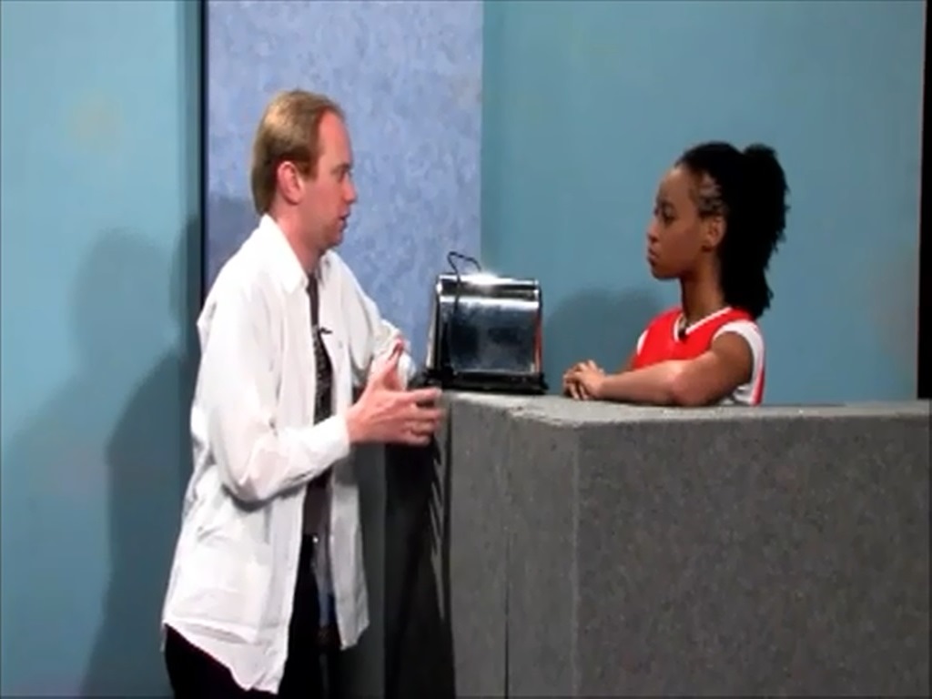 Tom Myers and Brittany Williams in a television production at Towson University, Towson, MD. (2012)